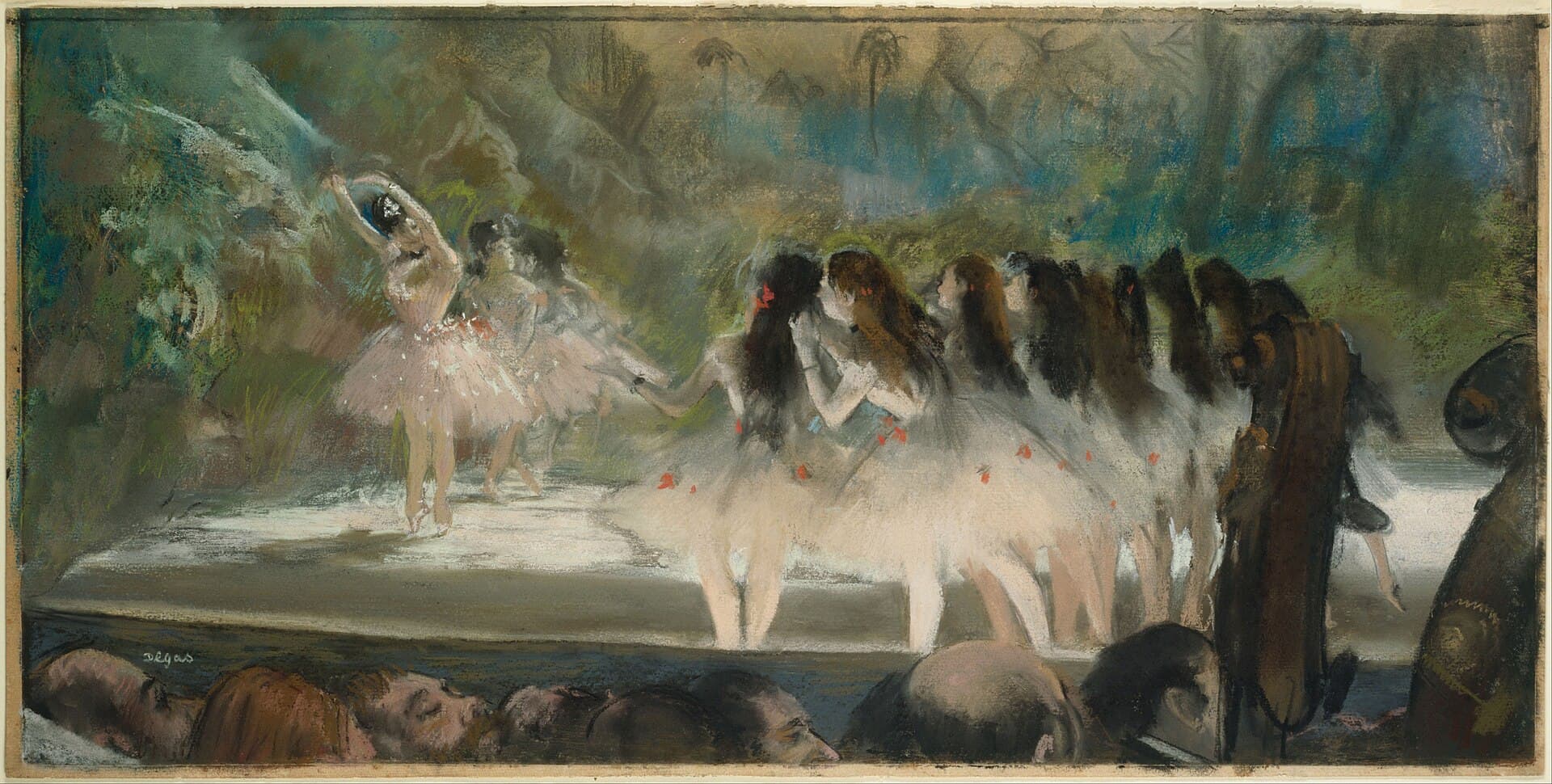 A frieze of dancers in pale tutus performs across a wide stage, framed by dark wings and a half-visible orchestra pit below.
