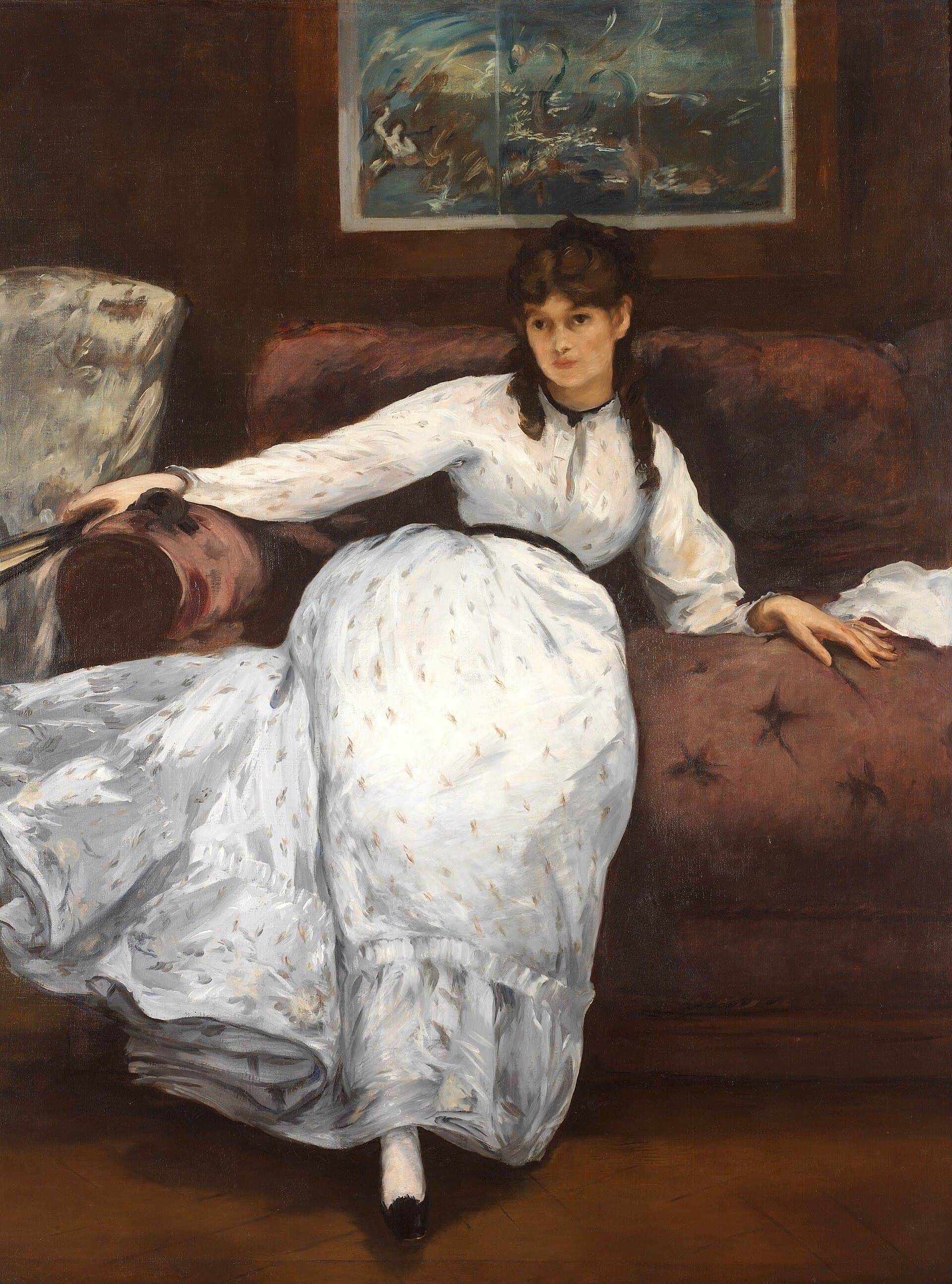 Berthe Morisot reclines on a white sofa in a black dress, head resting on her hand in a pose of studied nonchalance.