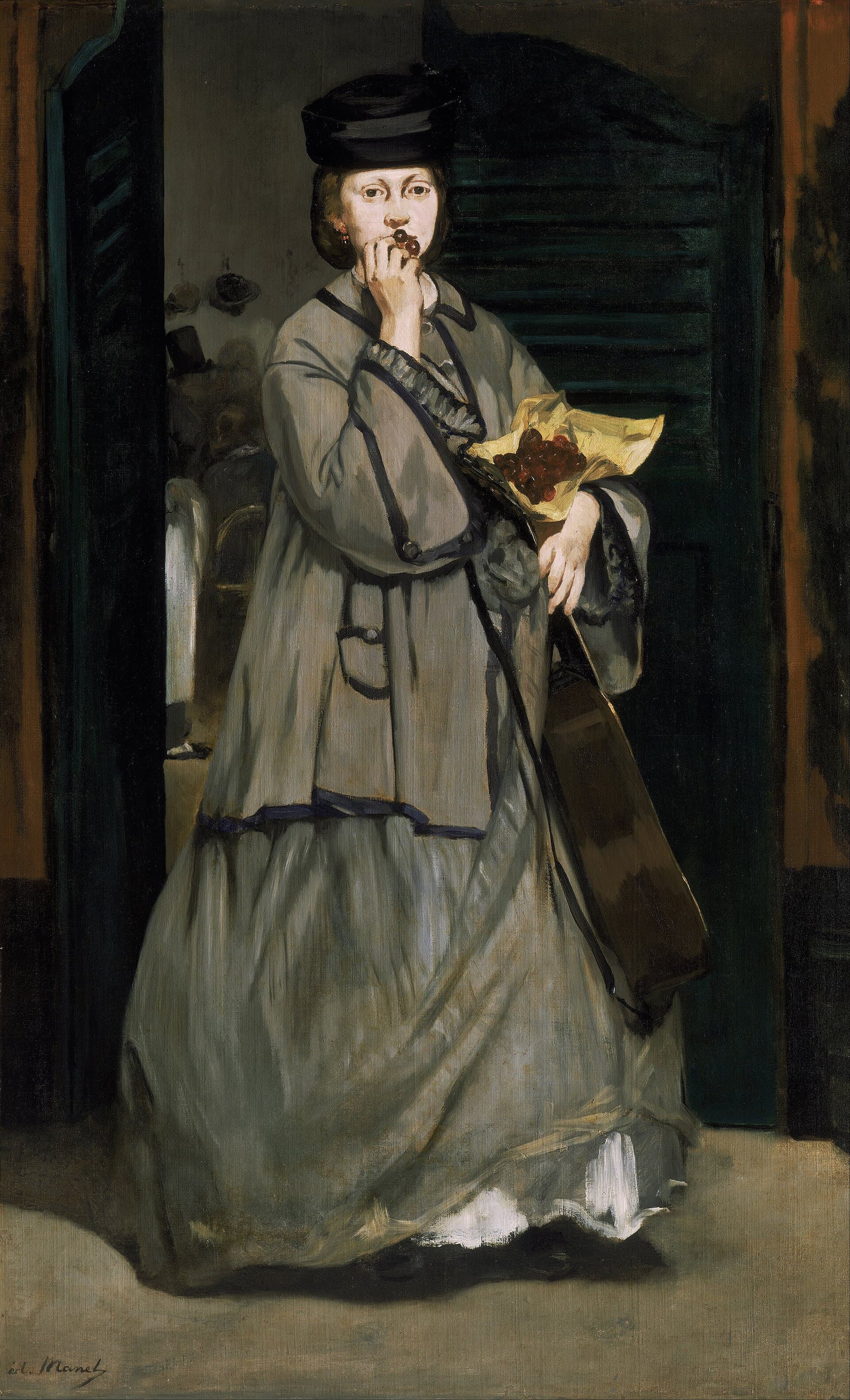 A woman in a grey dress carries a guitar and eats cherries as she exits a café behind a swinging curtain.