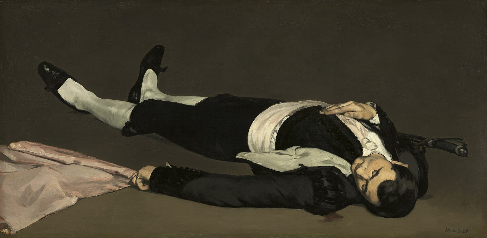A bullfighter in black and silver lies on his back on a dark ground, foreshortened as if seen from above.