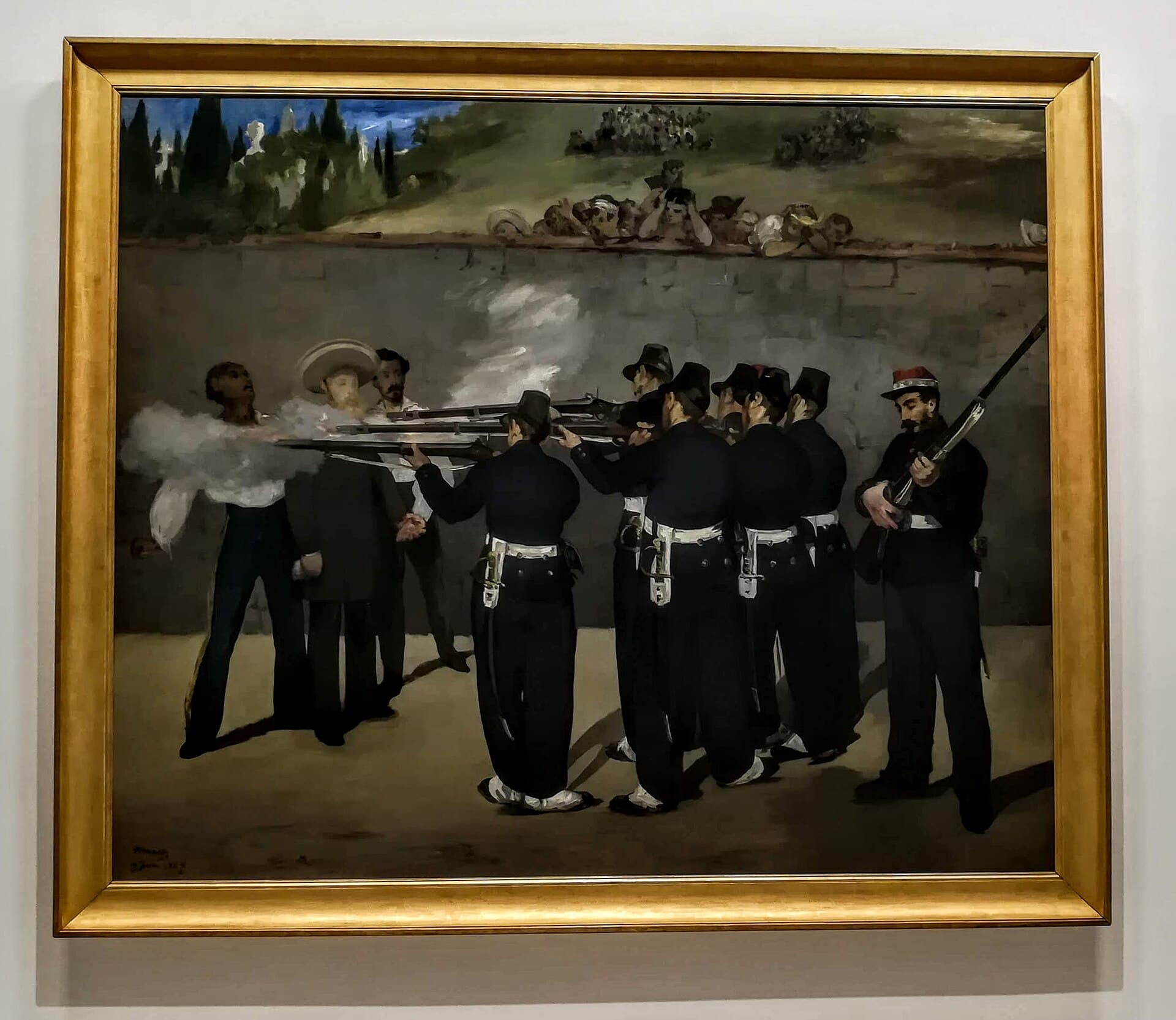 A Mexican firing squad in military uniforms executes Emperor Maximilian and two generals at close range.